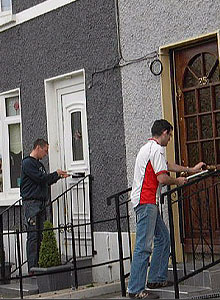 Click on image to see full-sized version éirígí activists distribute poster-size copies of the 1916 Proclamation door-to-door