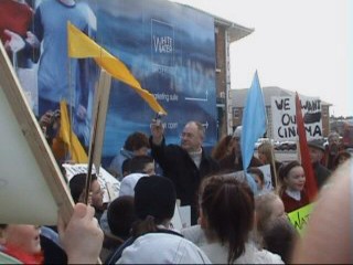 Click on image to see full-sized version Local politician Pat Black holds up his phone to let local station here protestor's chants