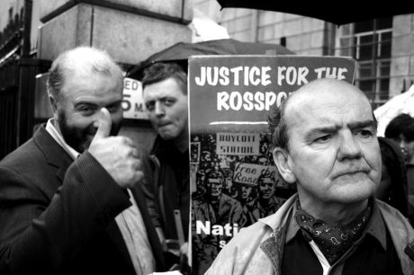 Click on image to see full-sized version Willie Corduff gives the thumbs up as Micheál Ó Seighin speaks to reporters following their release from prison on Sept 30, 2005