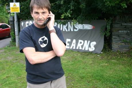 Click on image to see full-sized version Jim getting some legal advice before his arrest