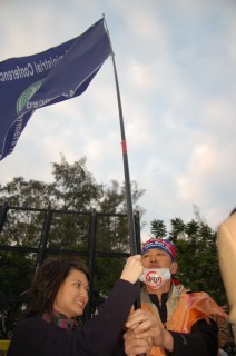 School girl with the Korean Farmers Federation flag