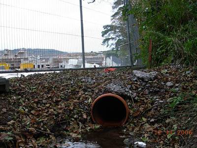 Click on image to see full-sized version Water unceremoniously channelled down plastic pipe