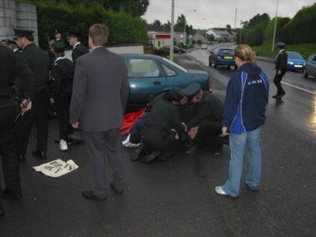 Click on image to see full-sized version Ógra activist assaulted by PSNI at peaceful protest (Omagh, Co. Tyrone)