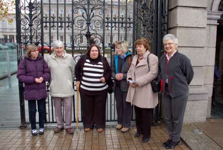 The family with TDs Catherine Murphy and Katherine Zappone before a meeting at the D�il