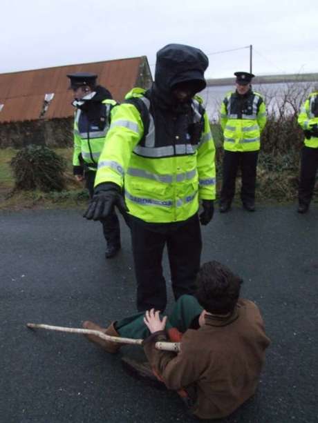 Person being pushed out of the road by Garda�