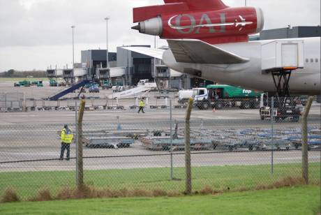 Two Gardai patrolling OMNI Air troop carrier at Shannon 8 Jan 2012
