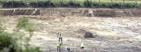 Note the depth of the digging and the size of machine marks