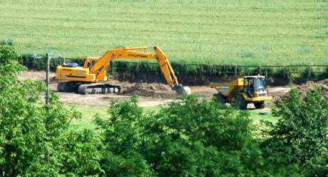 Dig it up, shift it, dump it ..