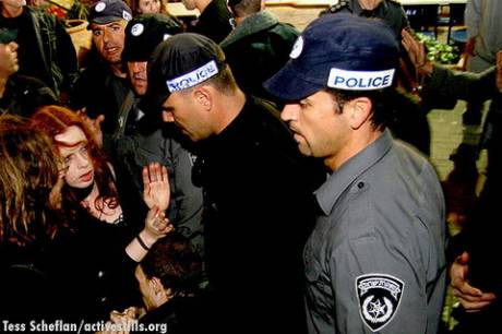 Police and demonstrators in Tel Aviv