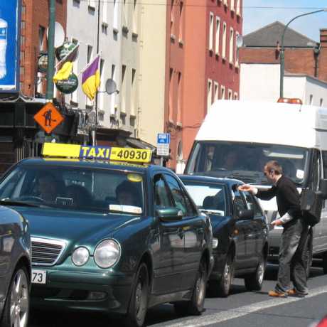 Leafletting passing cars
