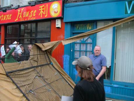 Click on image to see full-sized version Pro Lifer pushes scaffolding onto activists