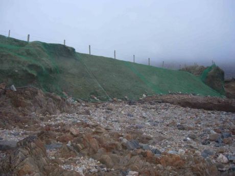 Click on image to see full-sized version Net over cliff