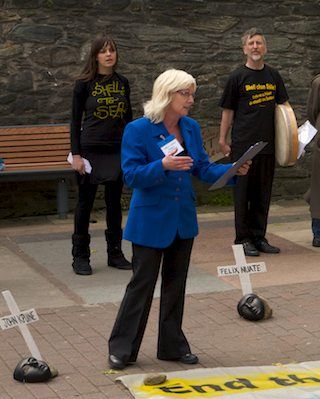 Click on image to see full-sized version Activist gives a speech as the Shell/Topaz Public Relations Officer