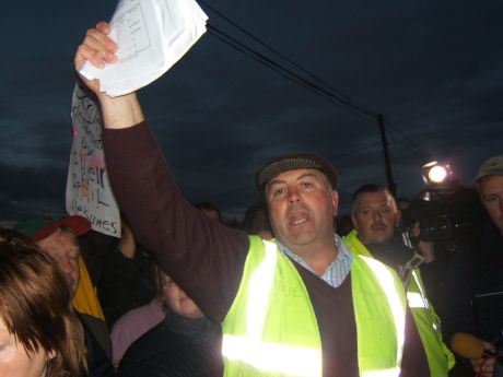 Willie Corduff addresses the crowd and the police.