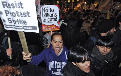 UK> Protesters break into government department.