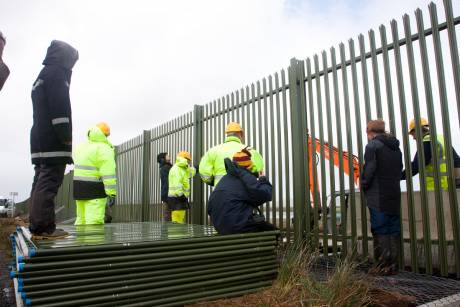 Click on image to see full-sized version fences stacked ready to move