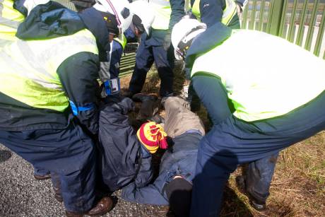 Click on image to see full-sized version irms manhandling people on the public road